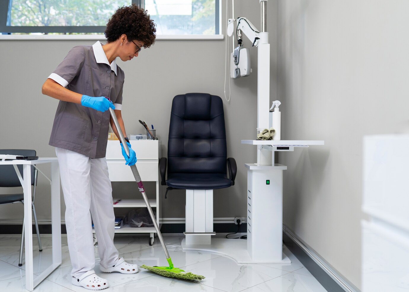 woman-cleaning-ophthalmologist-s-office_23-2150923379